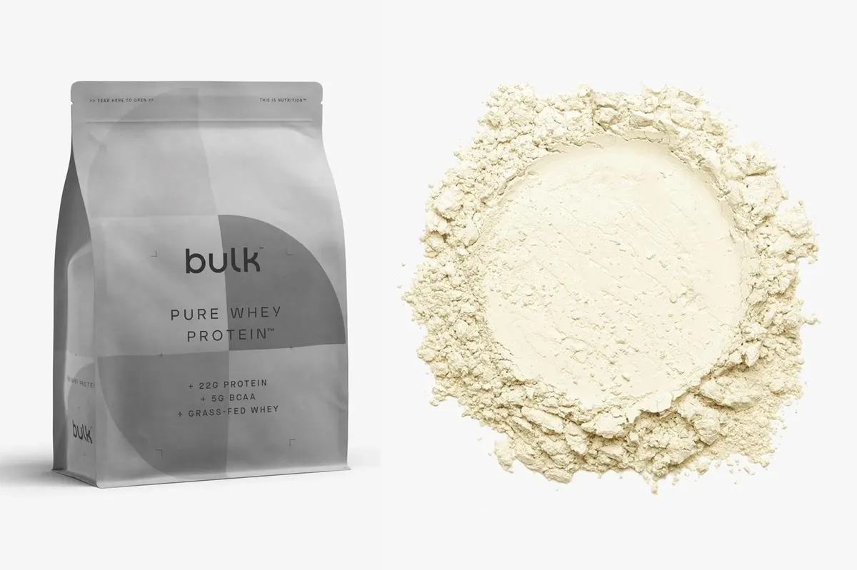 Bulk Pure Whey Protein Powder pack and powder on a grey background