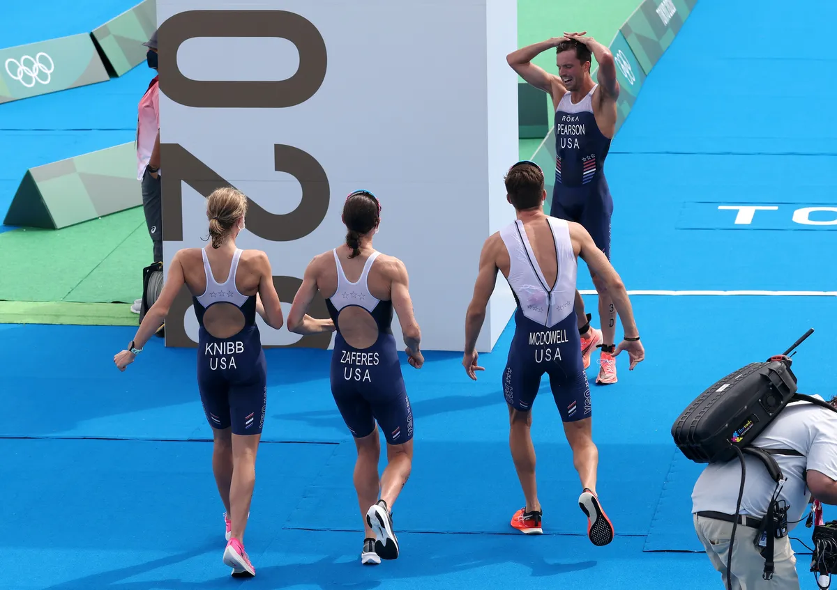 Taylor Knibb celebrates after winning Olympic silver in the mixed relay triathlon