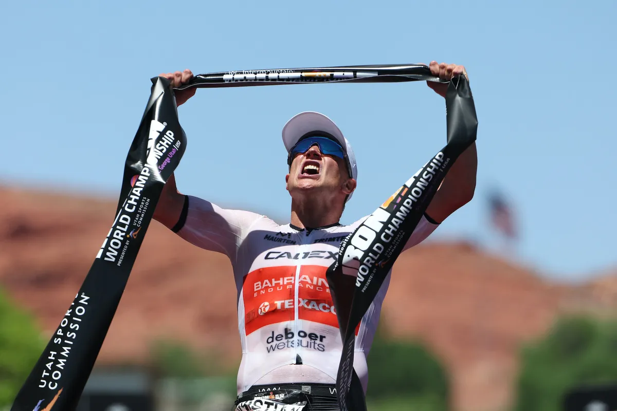 Kristian Blummenfelt celebrates winning the Ironman World Championship