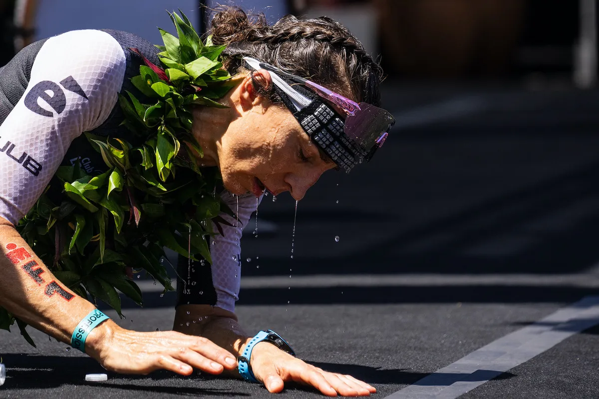 Anne Haug collects herself at the finish line of the Ironman World Championship