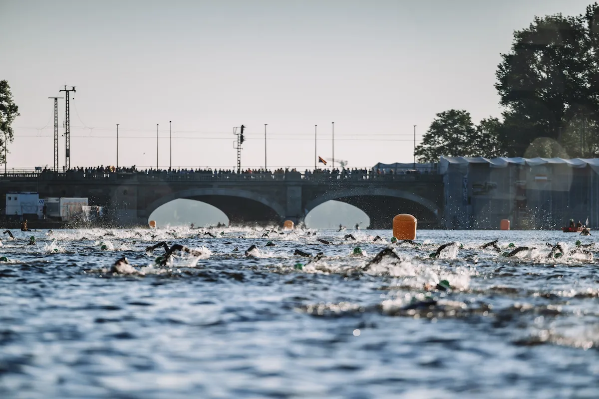 Athletes swim during Ironman Hamburg