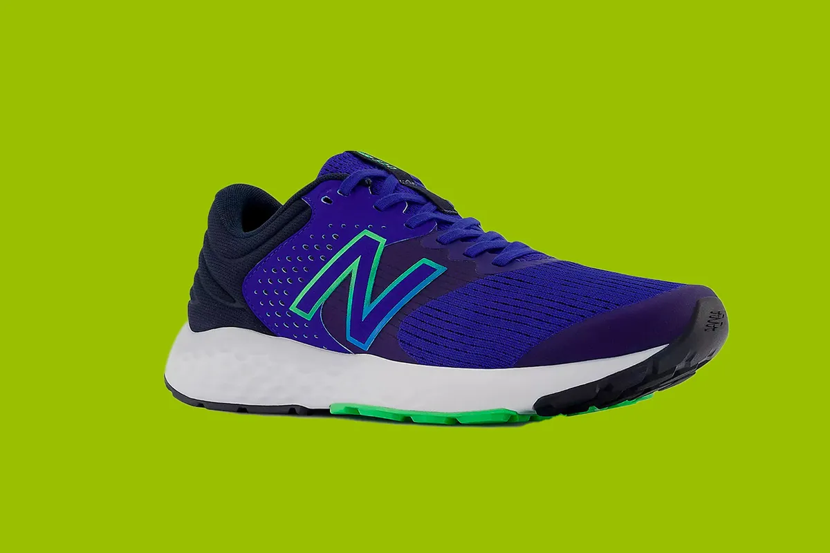 New Balance 520v7 run shoes on a green background