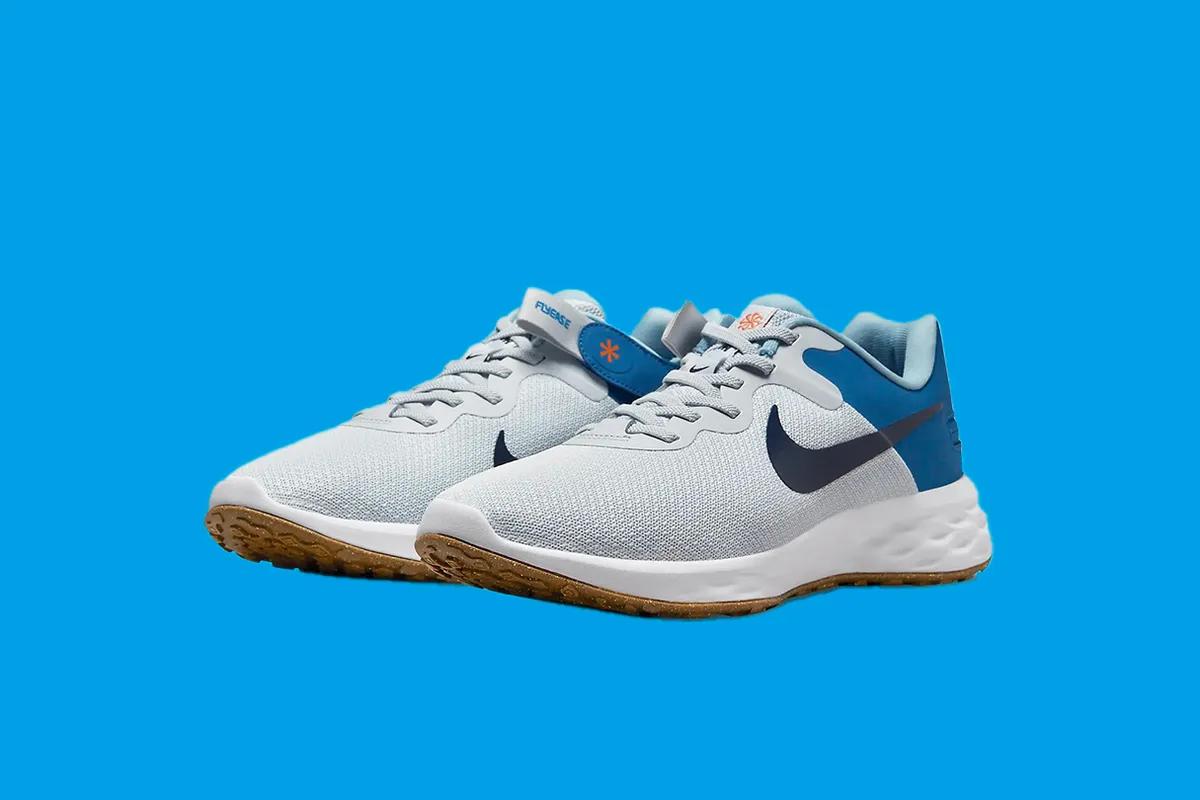 Nike Revolution 6 FlyEase Next Nature on a blue background