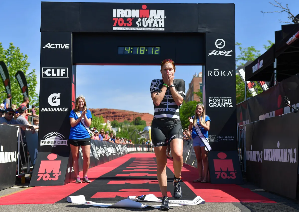 ST GEORGE, UT - MAY 05: Paula Findlay of Canada crosses the finish line to win the IRONMAN 70.3 St George Utah on May 5, 2018 in St George, Utah. (Photo by Donald Miralle/Getty Images)