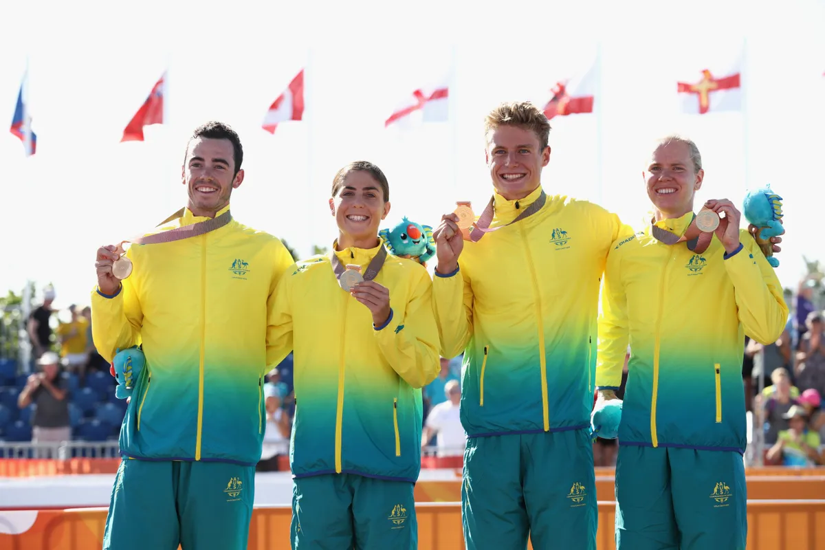 team australia show their gold medals after achieveing commonwealth gold in 2018