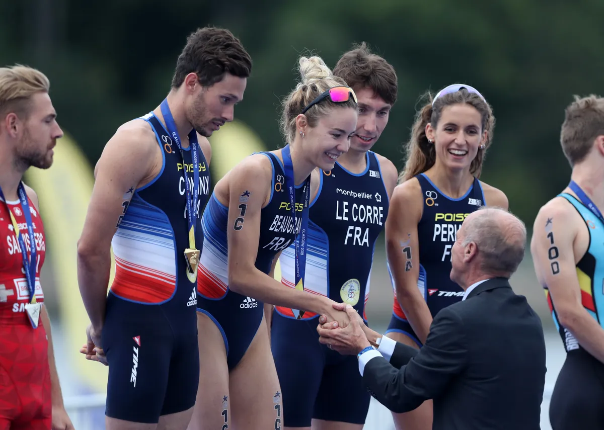 Beaugrand receives her gold medal after winning the Mixed Team Relay Triathlon at the Glasgow European Championships Glasgow 2018 (Credit: Ian MacNicol/Getty Images)