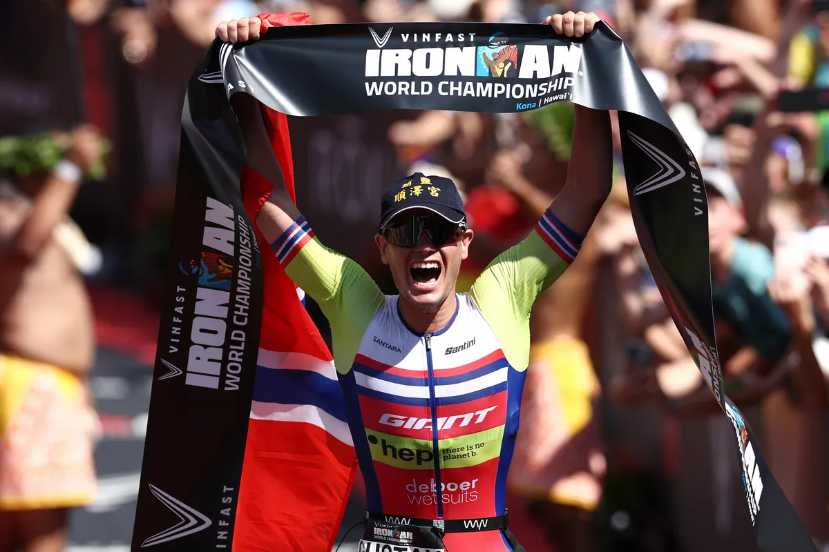 KAILUA KONA, HAWAII - OCTOBER 08: Gustav Iden of Norway celebrates after winning the IRONMAN World Championships on October 08, 2022 in Kailua Kona, Hawaii. (Photo by Tom Pennington/Getty Images for IRONMAN)