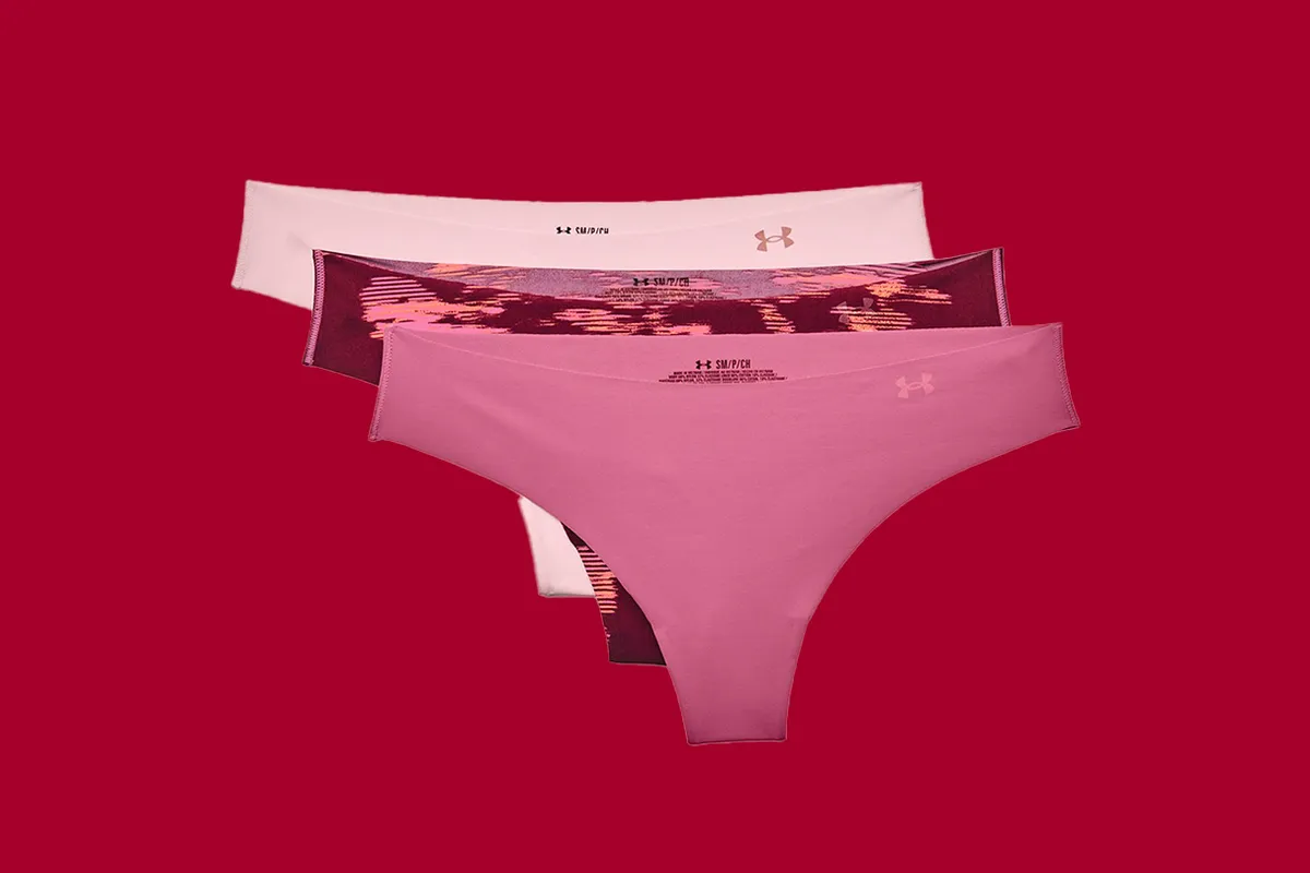 Under Armour UA Pure Stretch Thongs on a red background