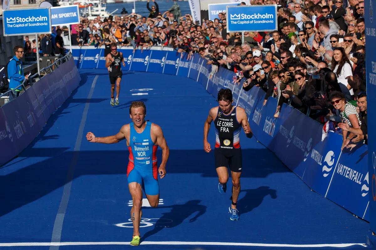 STOCKHOLM, SWEDEN - AUGUST 26: Athletes Kristian Blummenfelt from Norway (L) second and Pierre Le Corre from France (R) third cross the finish line during the men's Elite race of Vattenfall World Triathlon Stockholm on August 26, 2017 in Stockholm, Sweden. (Photo by Pablo Blazquez Dominguez/Getty Images for WTS)