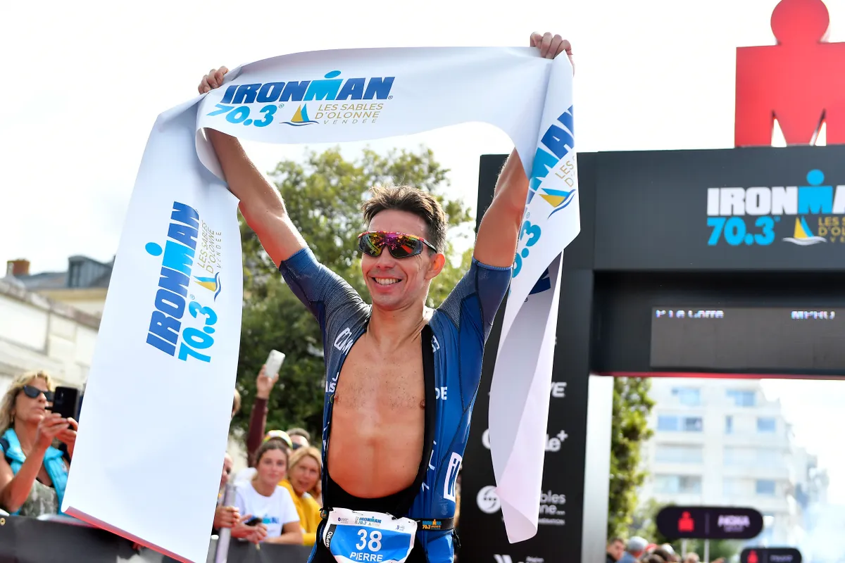 NANTES, FRANCE - JULY 03: Pierre Le Corre of France reacts after winning the IRONMAN 70.3 Les Sables d'Olonne on July 03, 2022 in Nantes, France. (Photo by Aurelien Meunier/Getty Images for IRONMAN)