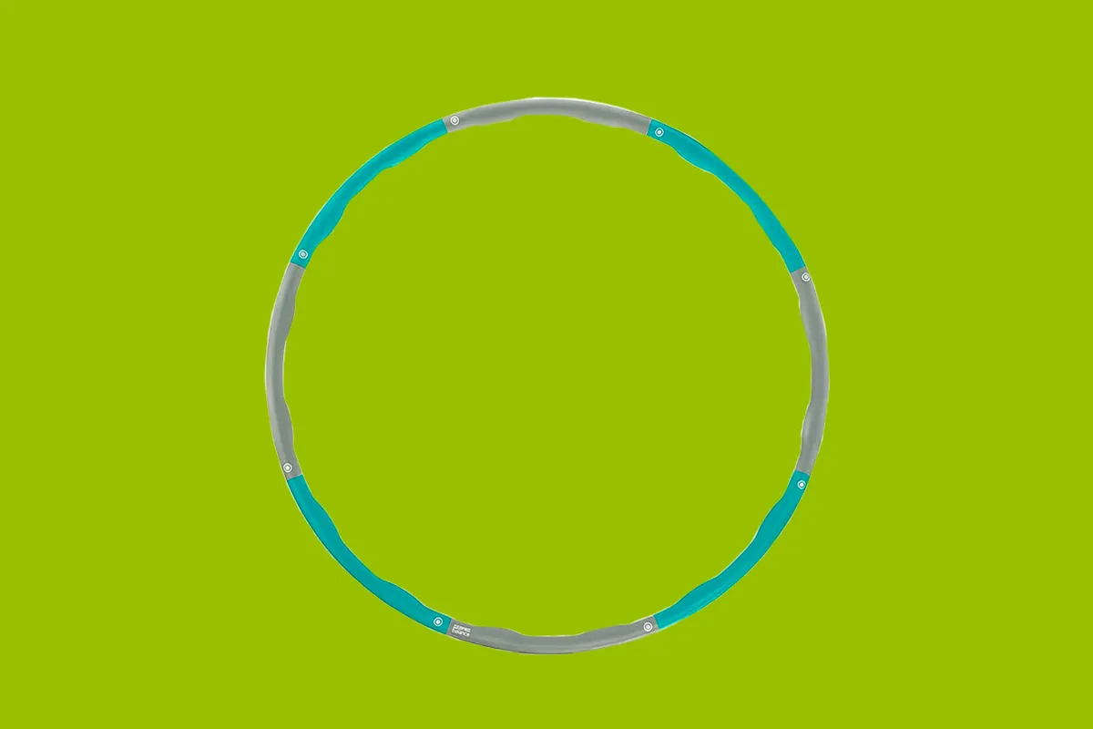 Core Balance Weighted Hula Hoop on a green background