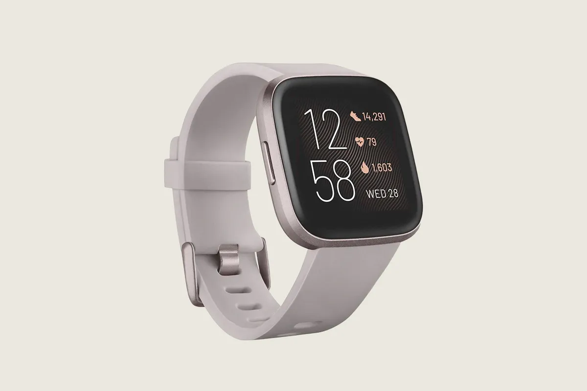 Fitbit Versa 2 on a grey background