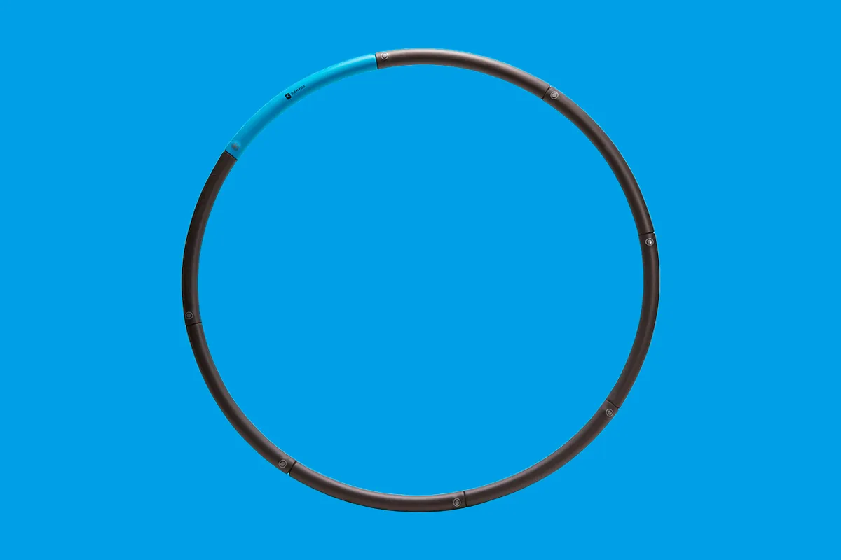 Domyos Fitness Weighted Hoop on a blue background