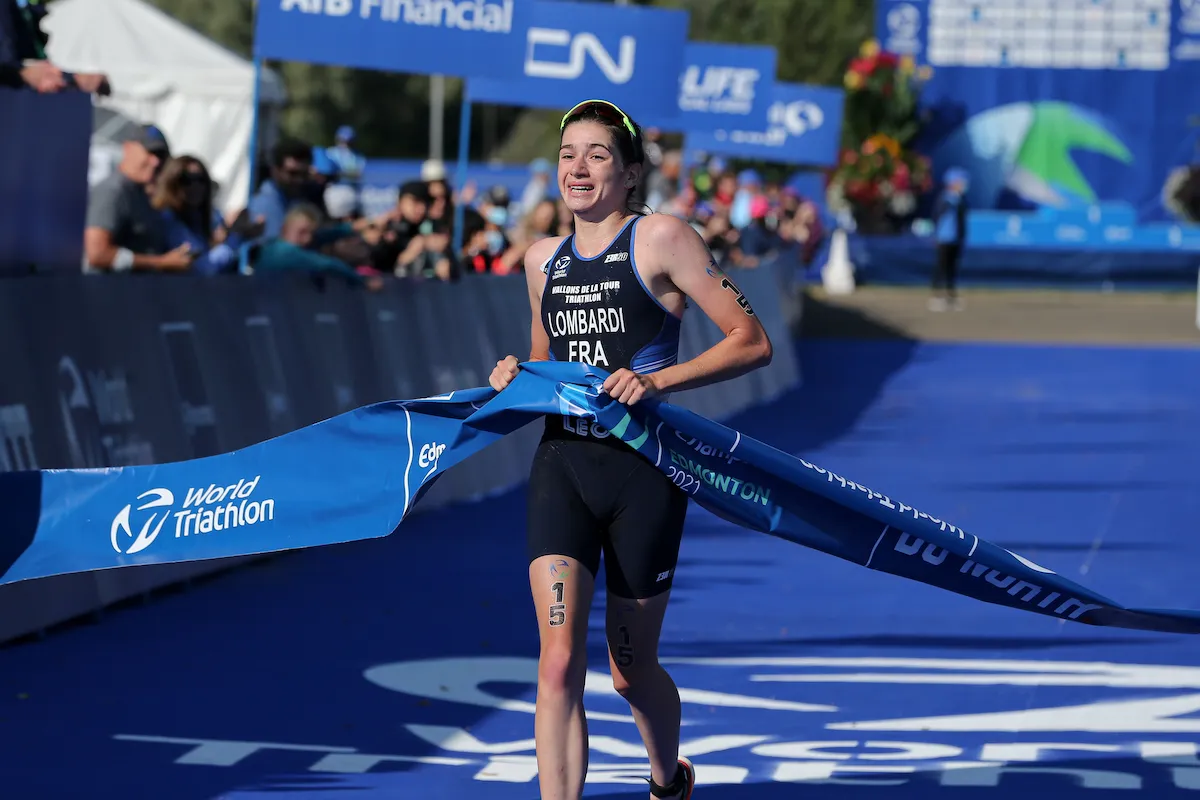 French triathlete Emma Lombardi breaks the tape to be crowned the 2021 U23 world champion