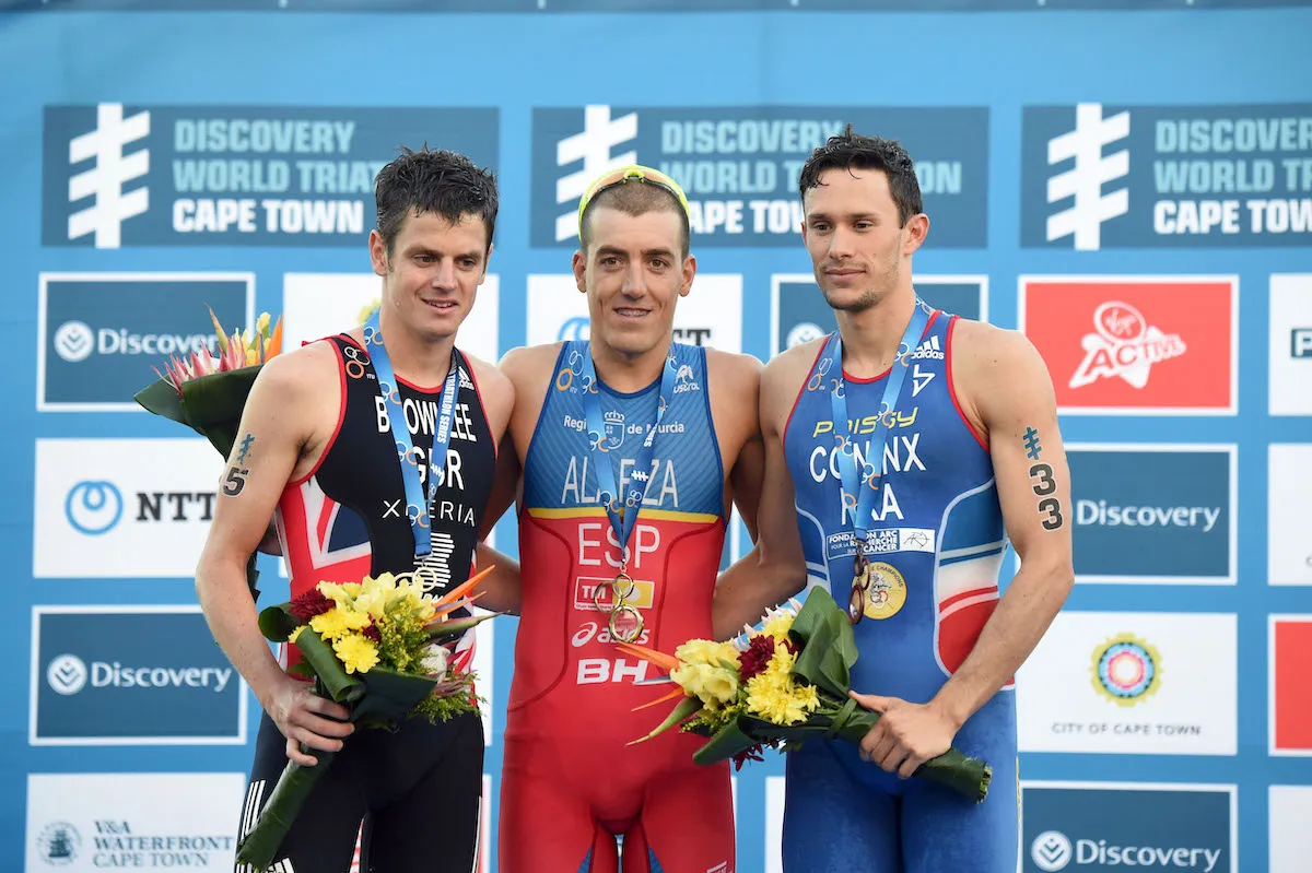 L-R: Jonny Brownlee (silver), Fernando Alarza (gold) and Dorian Coninx (bronze) on the podium of the 2016 World Triathlon Cape Town race
