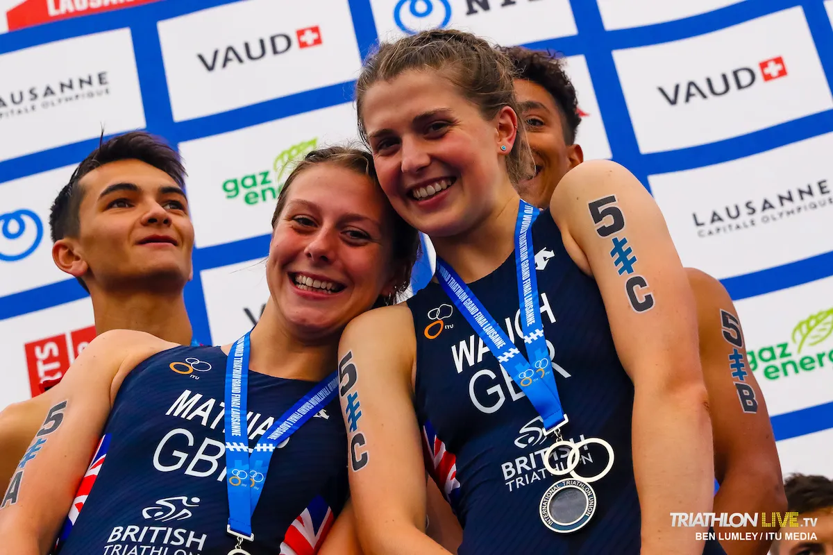 L-R: Alex Yee, Olivia Mathias, Kate Waugh and Ben Dijkstra on the podium wearing silver medals at the 2019 World U23/Junior Mixed Relay Champs in Lausanne