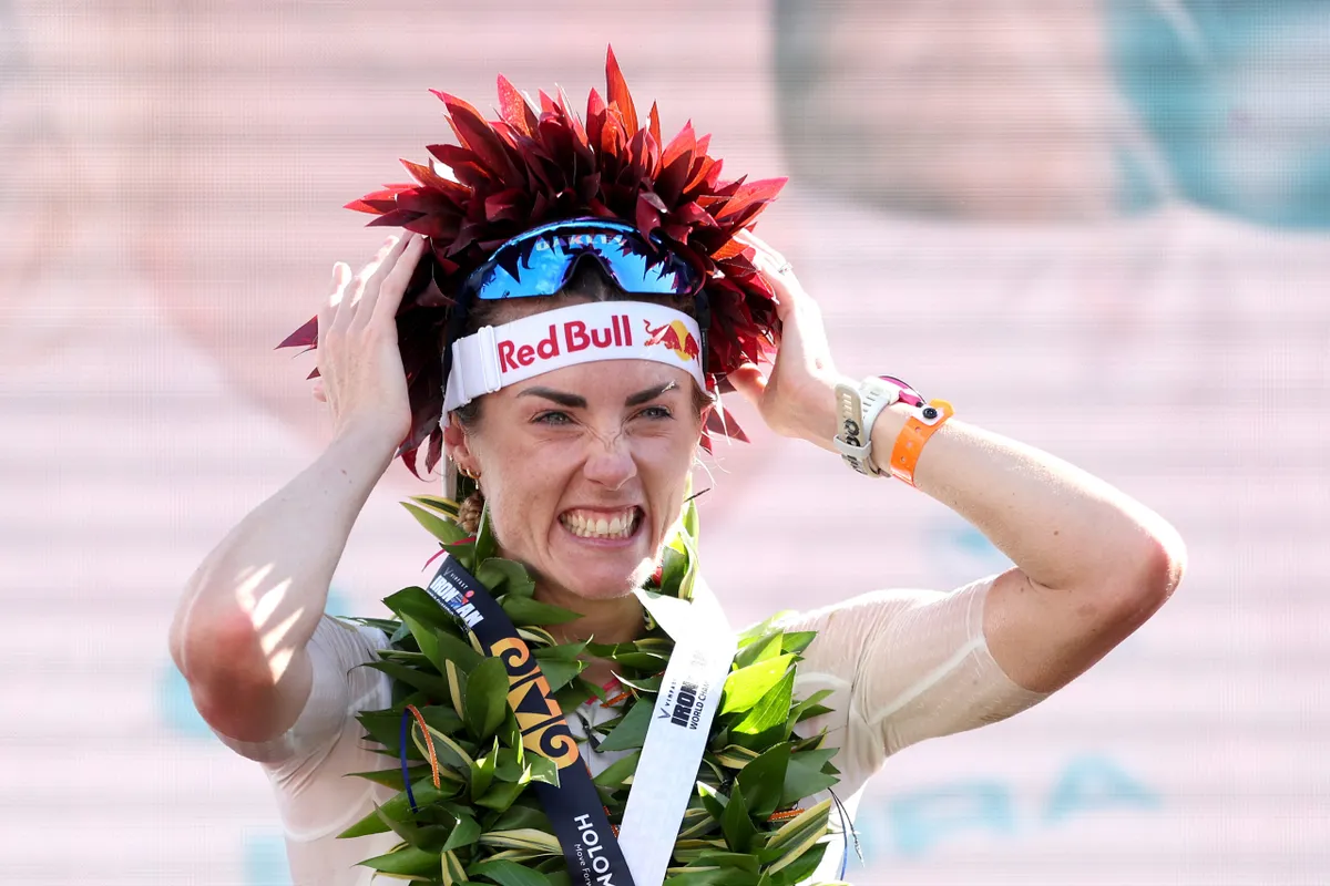Lucy Charles-Barclay celebrates after winning the 2023 Ironman World Championship in Kailua Kona, Hawaii