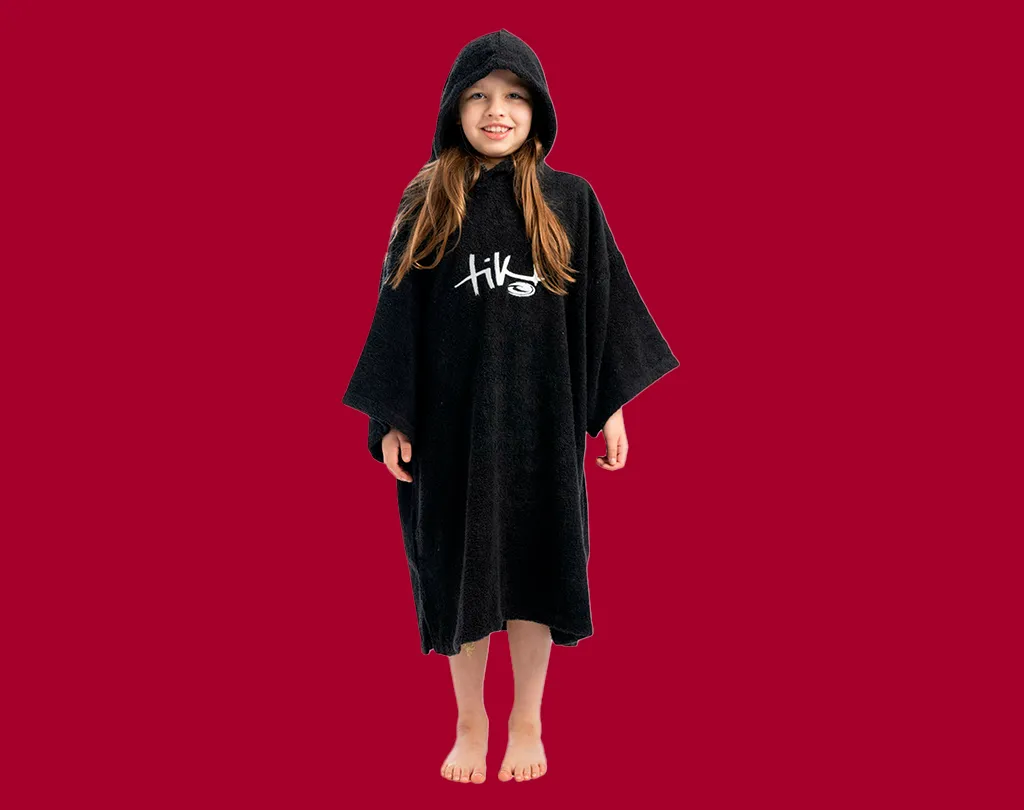 Tiki Surf Junior Hooded Change Robe on a red background