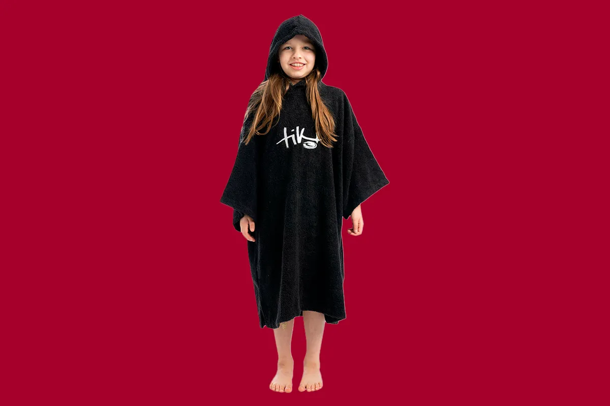 Tiki Surf Junior Hooded Change Robe on a red background