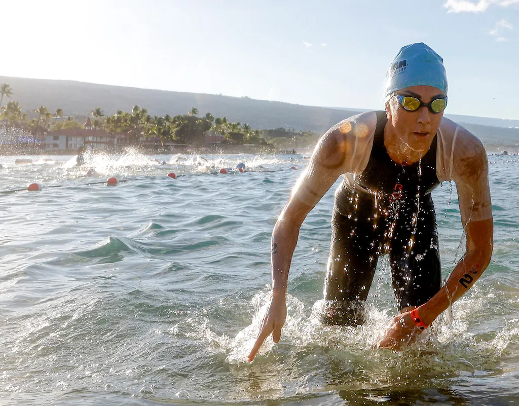 Lucy Charles-Barclay exits the swim in first place during the 2023 Ironman World Championship in Kailua Kona, Hawaii
