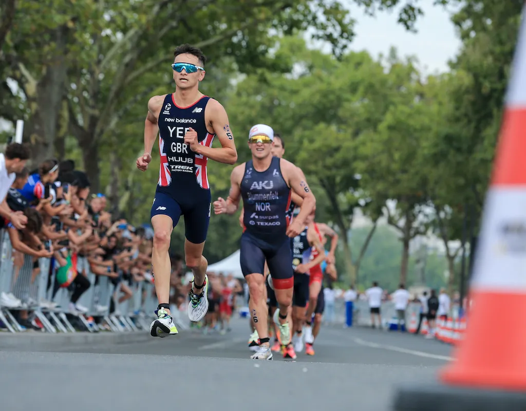 Alex Yee and Kristian Blummenfelt compete on the run leg of the Paris Olympics triathlon test event in 2023