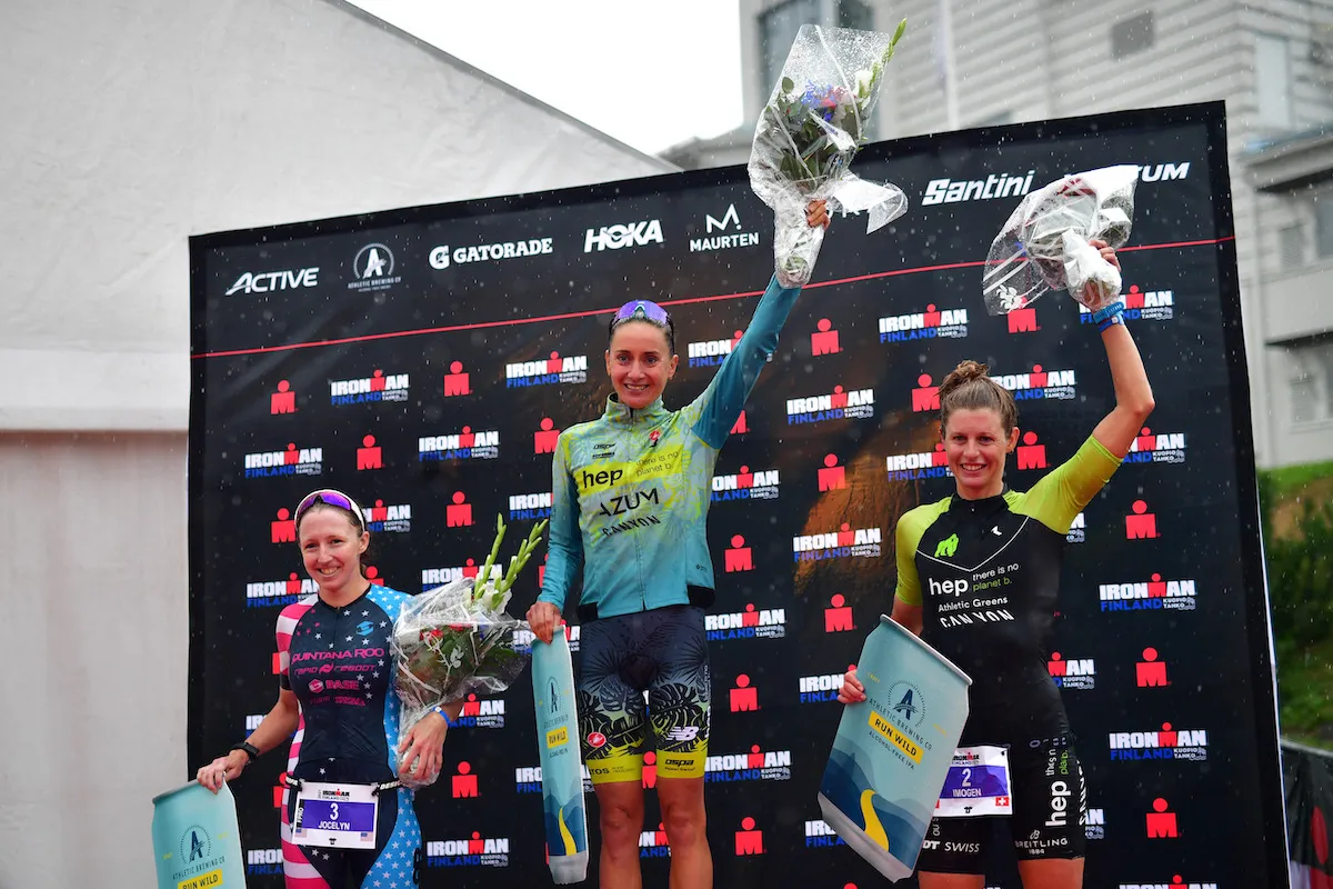 L-R: Jocelyn McCauley (2nd), Laura Philipp (1st) and Imogen Simmonds (3rd) on the podium of the 2021 Ironman Finland