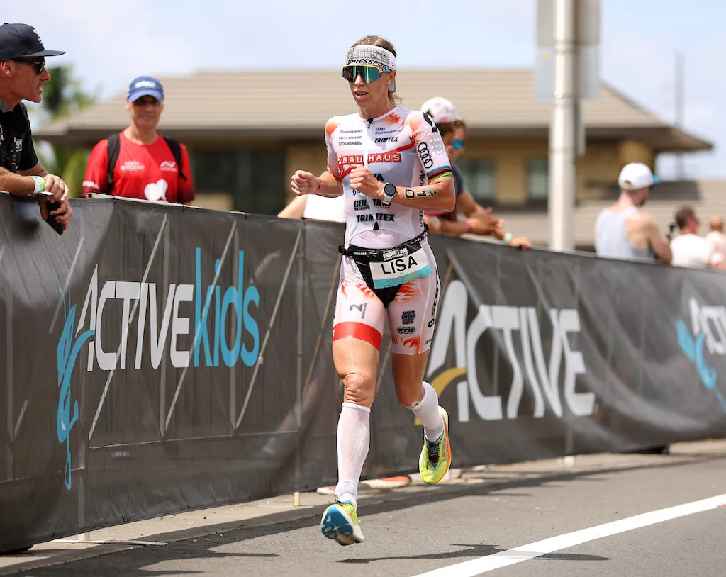 Lisa Norden competing on the final marathon of the 2022 Ironman World Championships in Kailua Kona, Hawaii