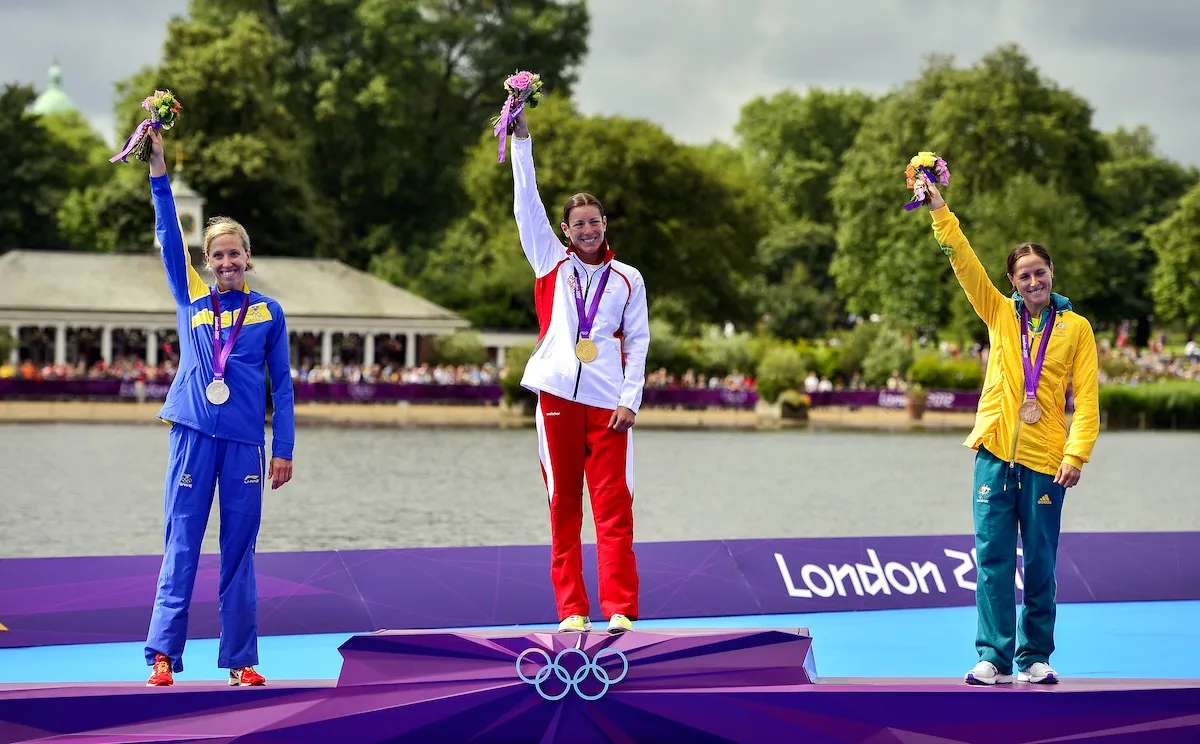L-R: Lisa Norden (silver), Nicola Spirig (gold) and Erin Densham (bronze) on the 2012 London Olympic Games women's triathlon podium