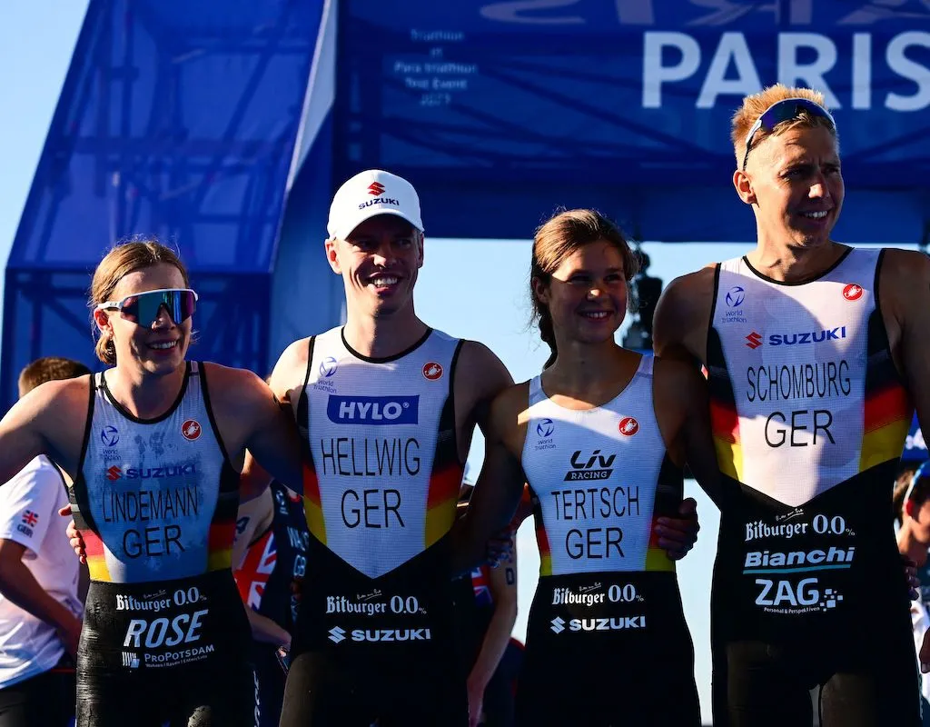 L-R: German athletes Laura Lindemann, Tim Hellwig, Lisa Tertsch and Jonas Schomburg celebrate after winning the mixed relay at the 2023 Paris Olympic Games Test Event