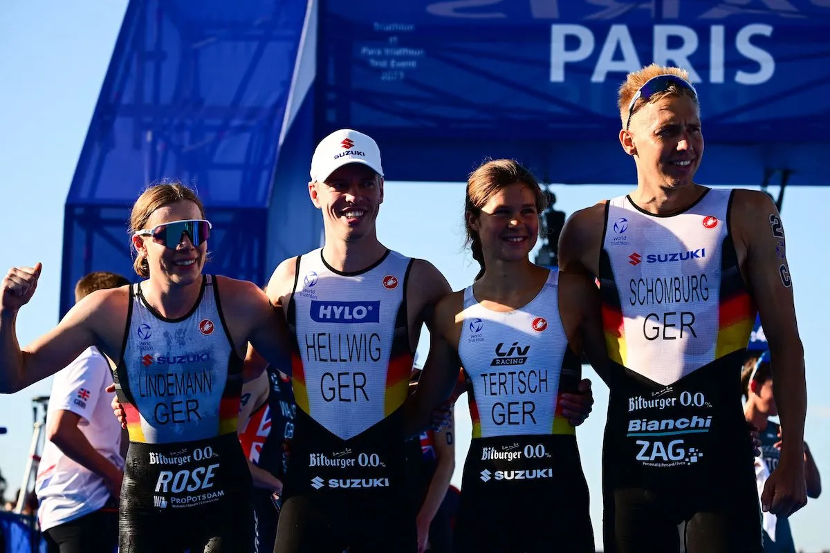 L-R: German athletes Laura Lindemann, Tim Hellwig, Lisa Tertsch and Jonas Schomburg celebrate after winning the mixed relay at the 2023 Paris Olympic Games Test Event