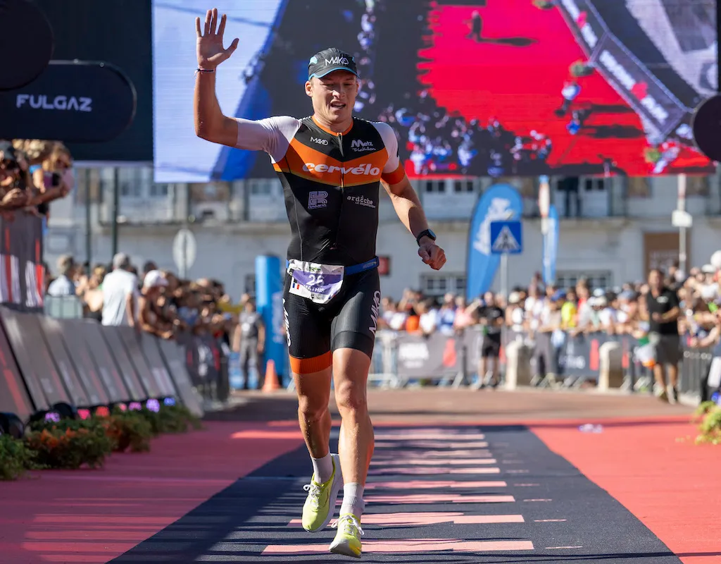 French triathlete Mathis Margirier celebrates finishing second at the 2022 Ironman 70.3 Portugal Cascais