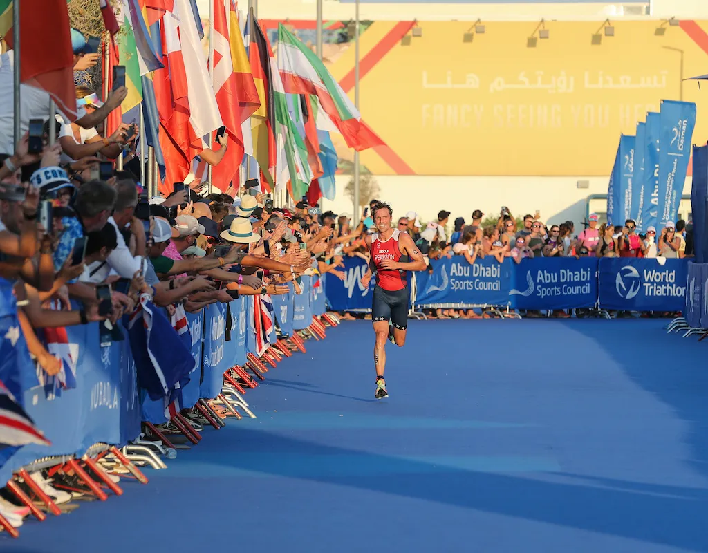 US triathlete Morgan Pearson runs home for silver at the 2022 WTCS Grand Final Abu Dhabi