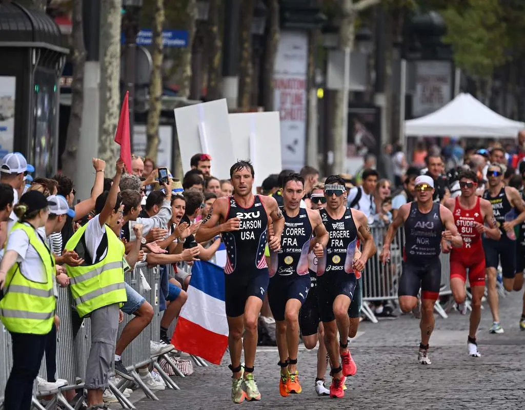 L-R: Morgan Pearson, Pierre Le Corre and Leo Bergere on the run leg of the 2023 Paris Olympic Games triathlon test event