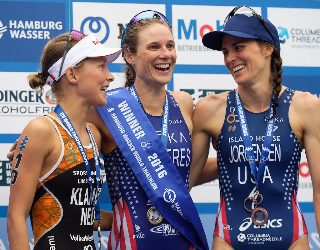 L-R: Rachel Klamer (silver), Katie Zaferes (gold) and Gwen Jorgensen (bronze) celebrate on the podium at the 2016 ITU World Triathlon Hamburg race. 