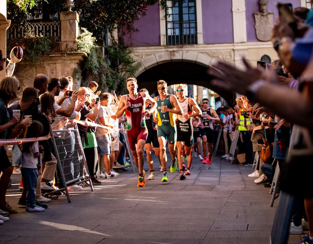 Hungarian triathlete Csongor Lehmann leads the run pack at the 2023 World Triathlon Grand Final in Pontevedra, Spain