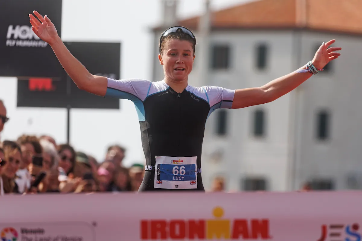 Lucy Byram crosses the finish line to win the 2022 Ironman 70.3 Venice-Jesolo, Italy