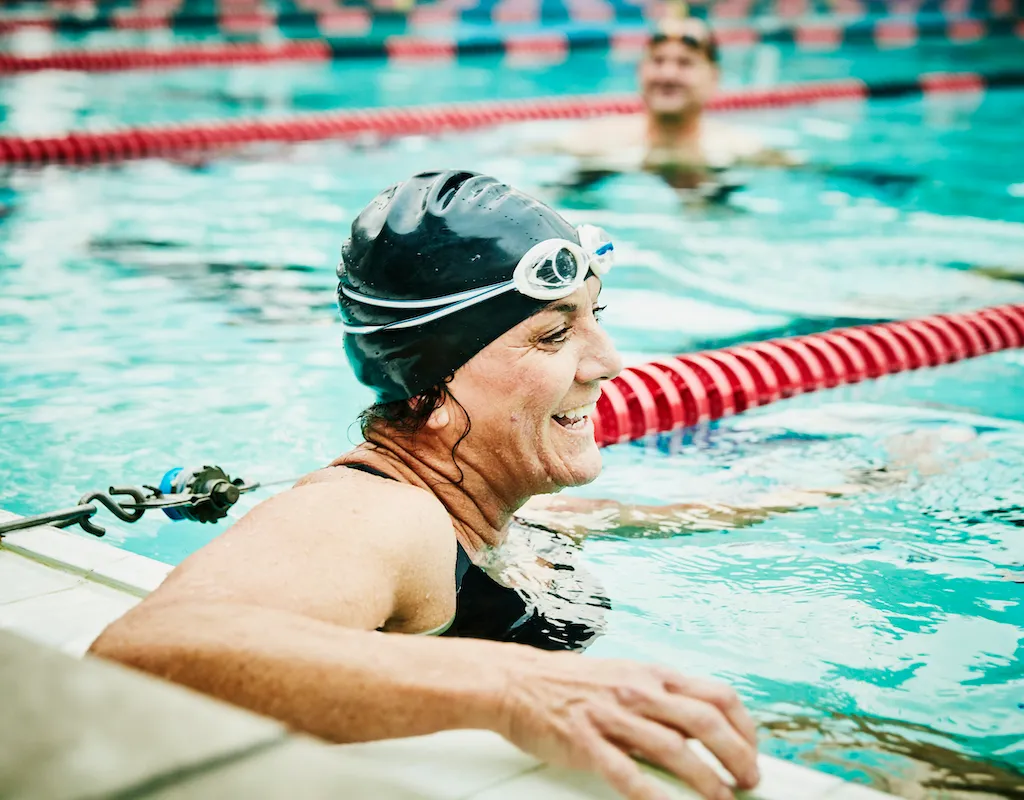 Woman thinking how many calories does swimming burn