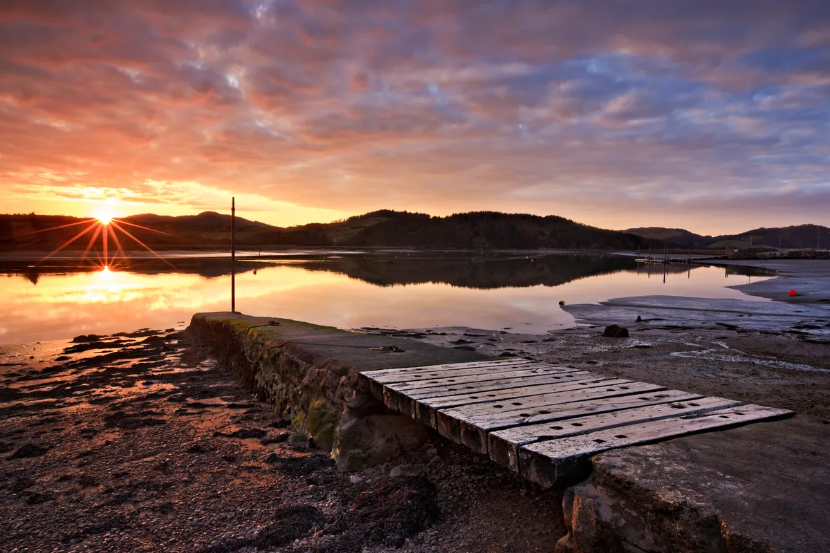 Sunset at Kippford, Dumfries and Galloway showing the River Urr and old Jetty, Scotland