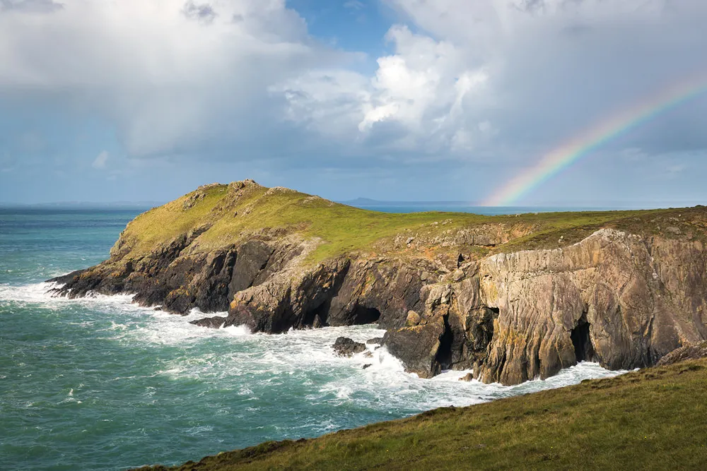 Rainbow above Wooltack Point on the Deer Park in Pembrokeshire, Wales, UK