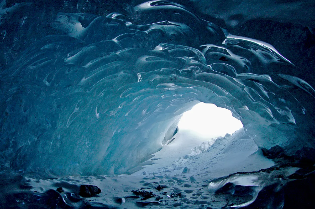 Inside an ice cave of the Morteratsch glacier, Engadin, Swiss Alps.