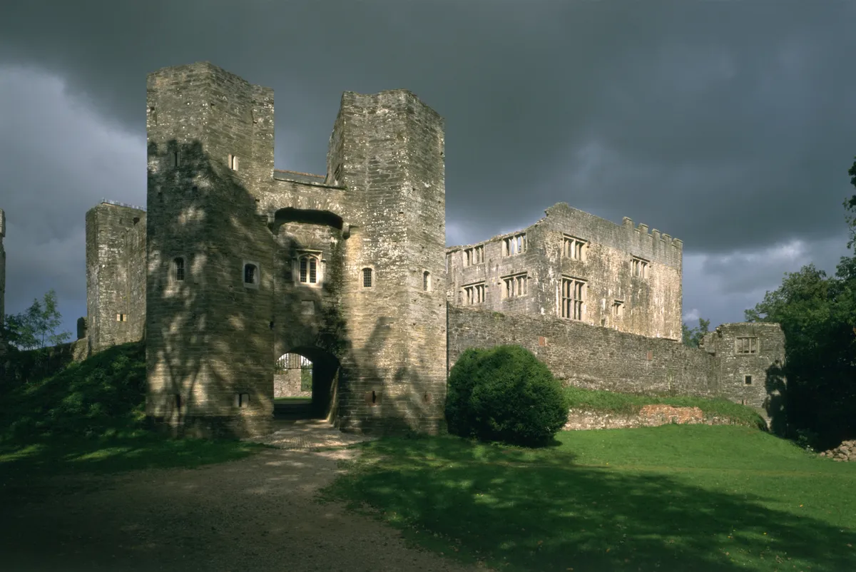 Berry Pomeroy Castle, Devon, 1995. Berry Pomeroy Castle combines a Tudor courtier's mansion within a 15th century castle. The gatehouse and curtain wall are part of the earlier castle, while the mansion with its many windows towers above the defences to the right. (Photo by English Heritage/Heritage Images/Getty Images)