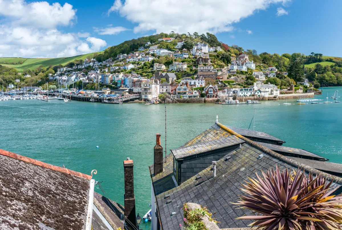 DARTMOUTH, DEVON, UNITED KINGDOM - 2015/05/09: (EDITORS NOTE: A polarizing filter was used for this image.) View at Harbor and Kingswear at the River Dart. (Photo by Olaf Protze/LightRocket via Getty Images)