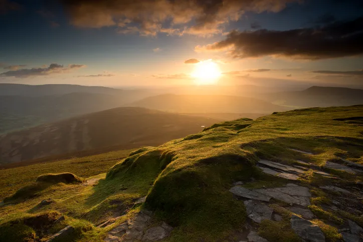 The summit of Sugar Loaf mountain, Mynydd Pen y Fal, in the Black Mountains, Brecon Beacons national park, Wales at sunrise.