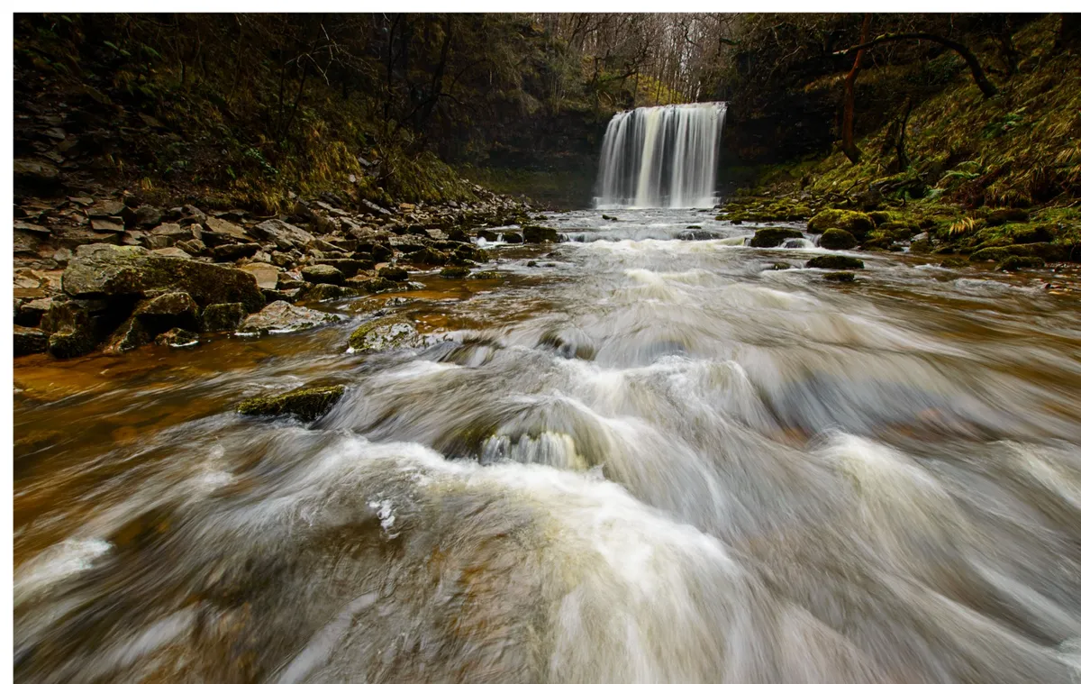 Rocks in front of the Sgwd yr Eira waterfall, Brecon Beacons, Wales