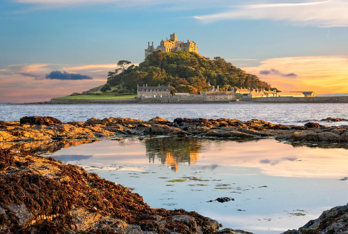 St Michael's Mount at sunset, surrounded by sea