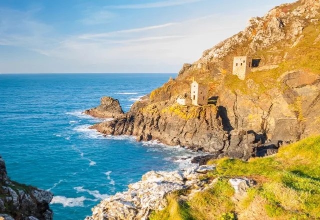 The Crown engine houses pearced on the cliffs at Botallack on near St Just Cornwall England UK Europe