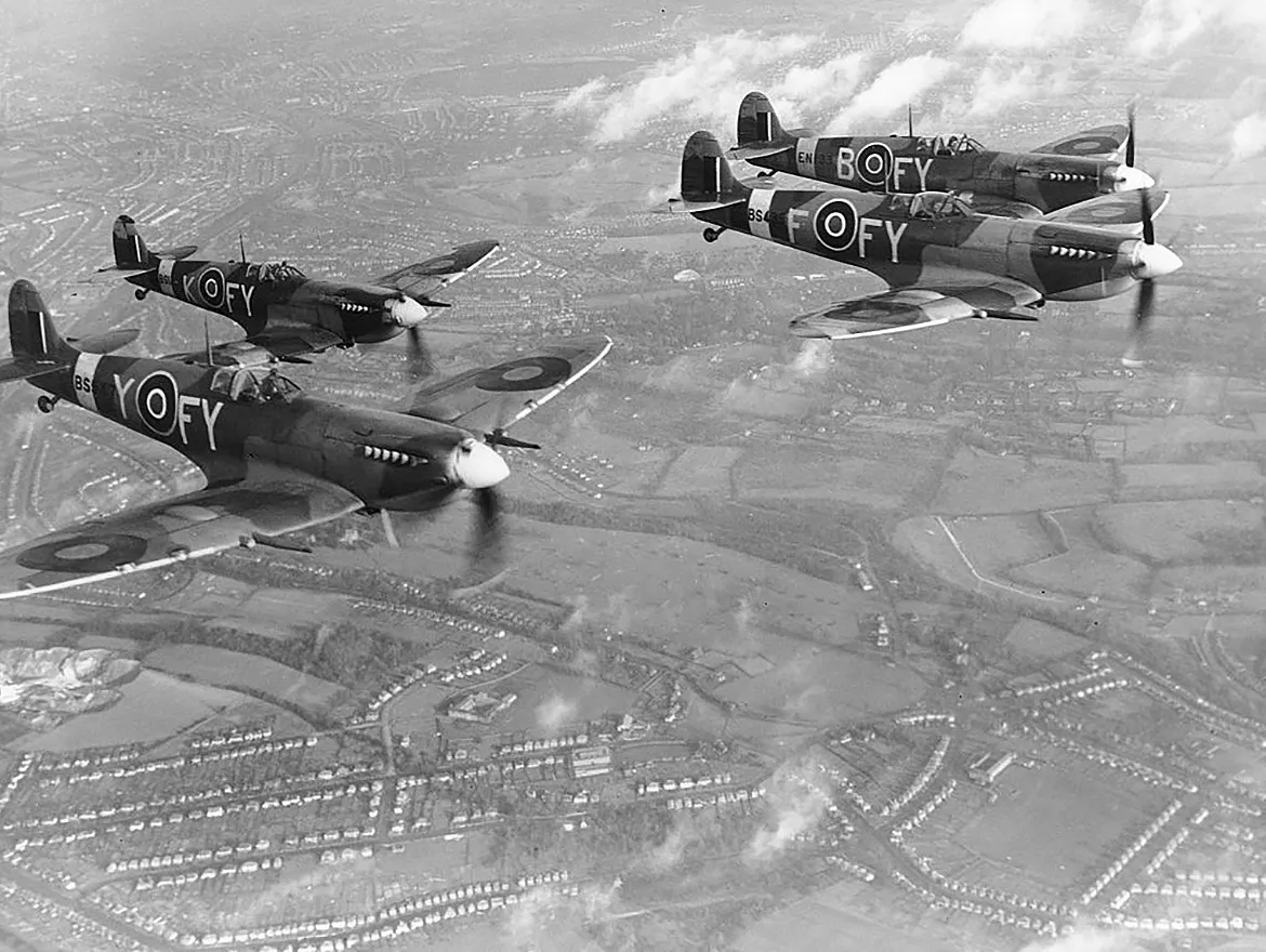 Supermarine Spitfire Mk. IXs (EN133 'FY-B', BS12? 'FY-K', BS435 'FY-F' and BS547 'FY-Y') of 611 Squadron, in flight, Biggin Hill, 8 December 1942. (Photo by Charles E. Brown/Royal Air Force Museum/Getty Images)