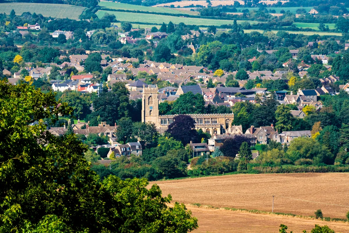 The Cotswold town of Winchcombe viewed from Cleeve Common near Cheltenham, Gloucestershire