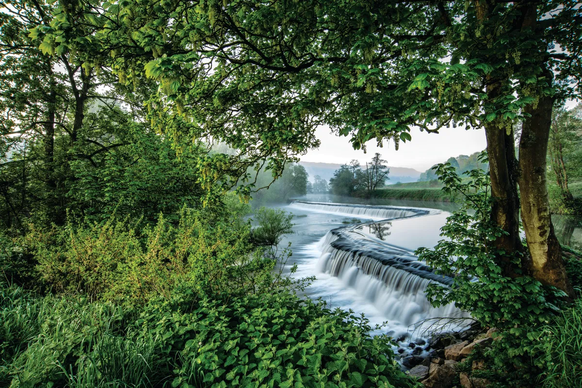 MKCMKT Warleigh Weir on the River Avon near Bath in Somerset.