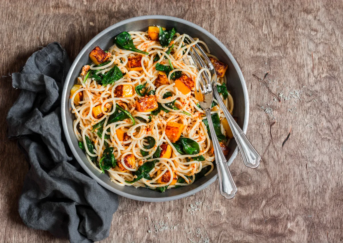 Pumpkin and spinach spaghetti/Credit: Getty Images